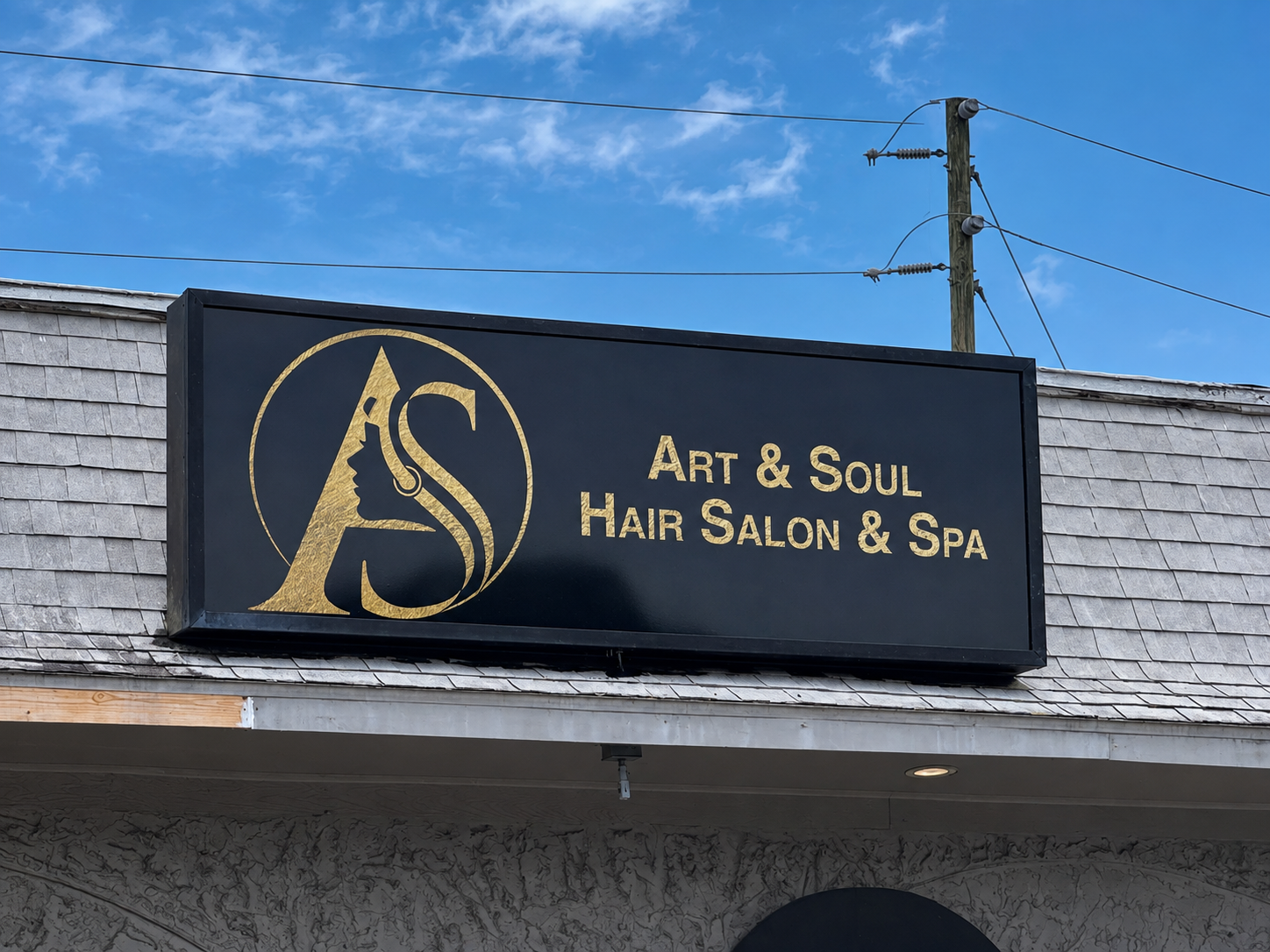 Alternate view of the exterior Art & Soul Hair Salon & Spa storefront sign